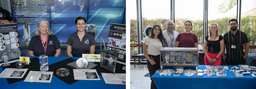 People sit or stand behind exhibit tables with information about space exploration.